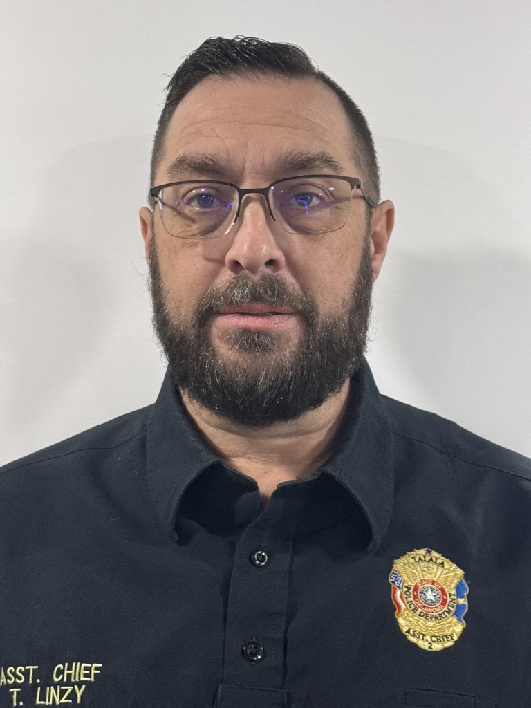 Travis Linzy, Assistant Chief of Police
