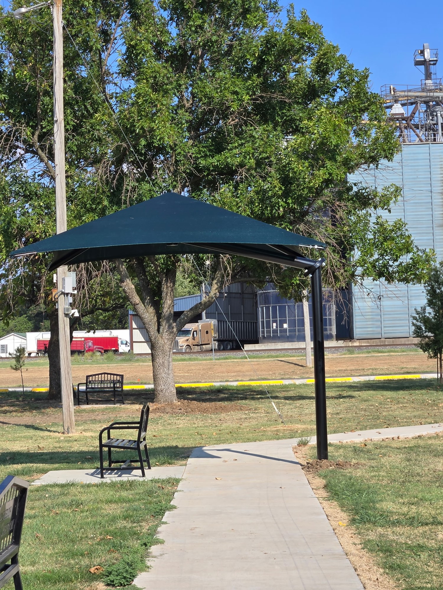 Shade canopy over park path